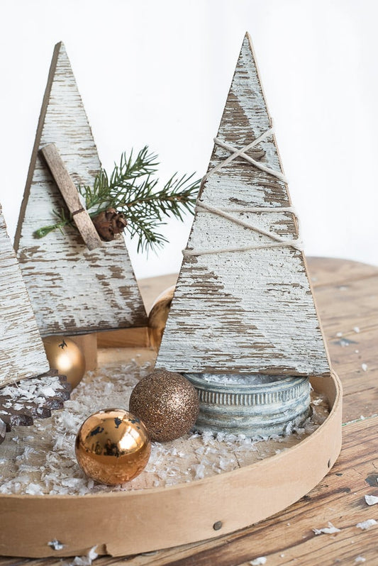 Create a Snow Effect with White Chippy Wood Trees